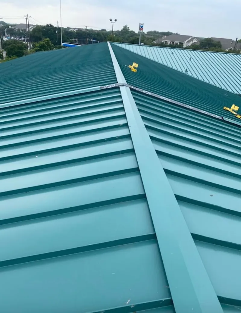 Green commercial metal roof ridge and valley for Metal Roof Repair in Oak Park